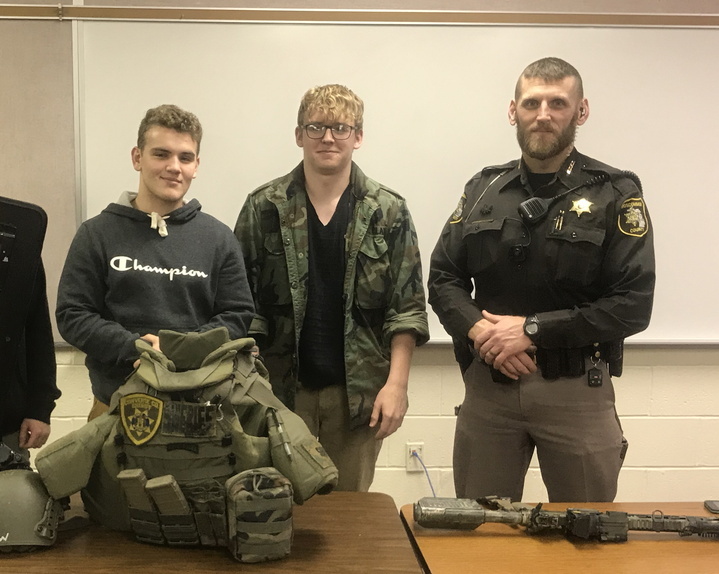 students learn about SWAT team