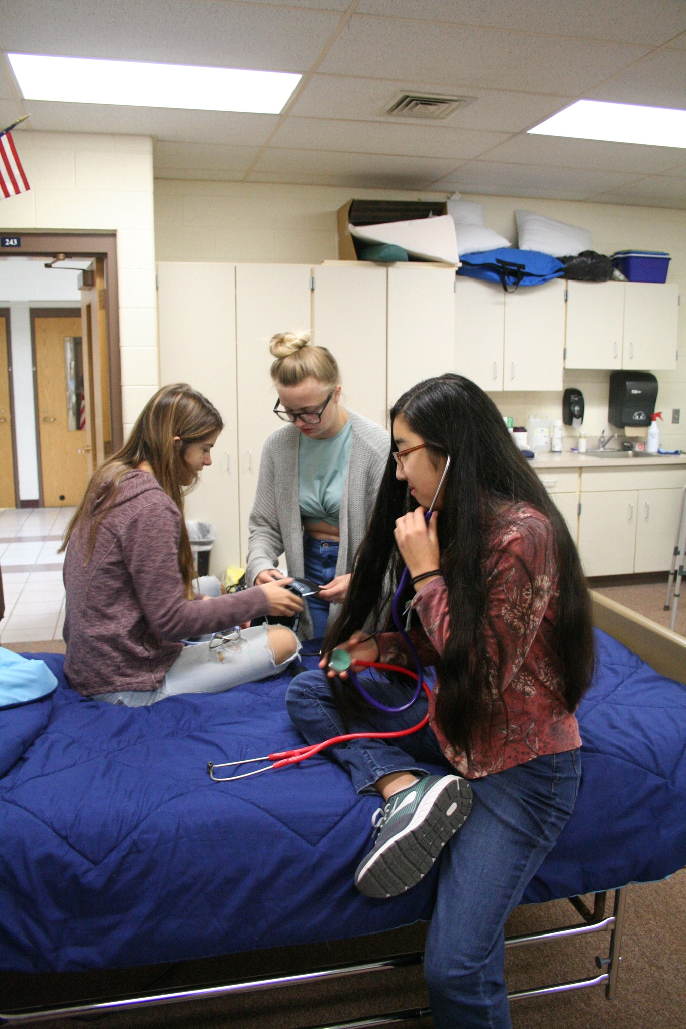 more Medical Occupations students practicing blood pressures