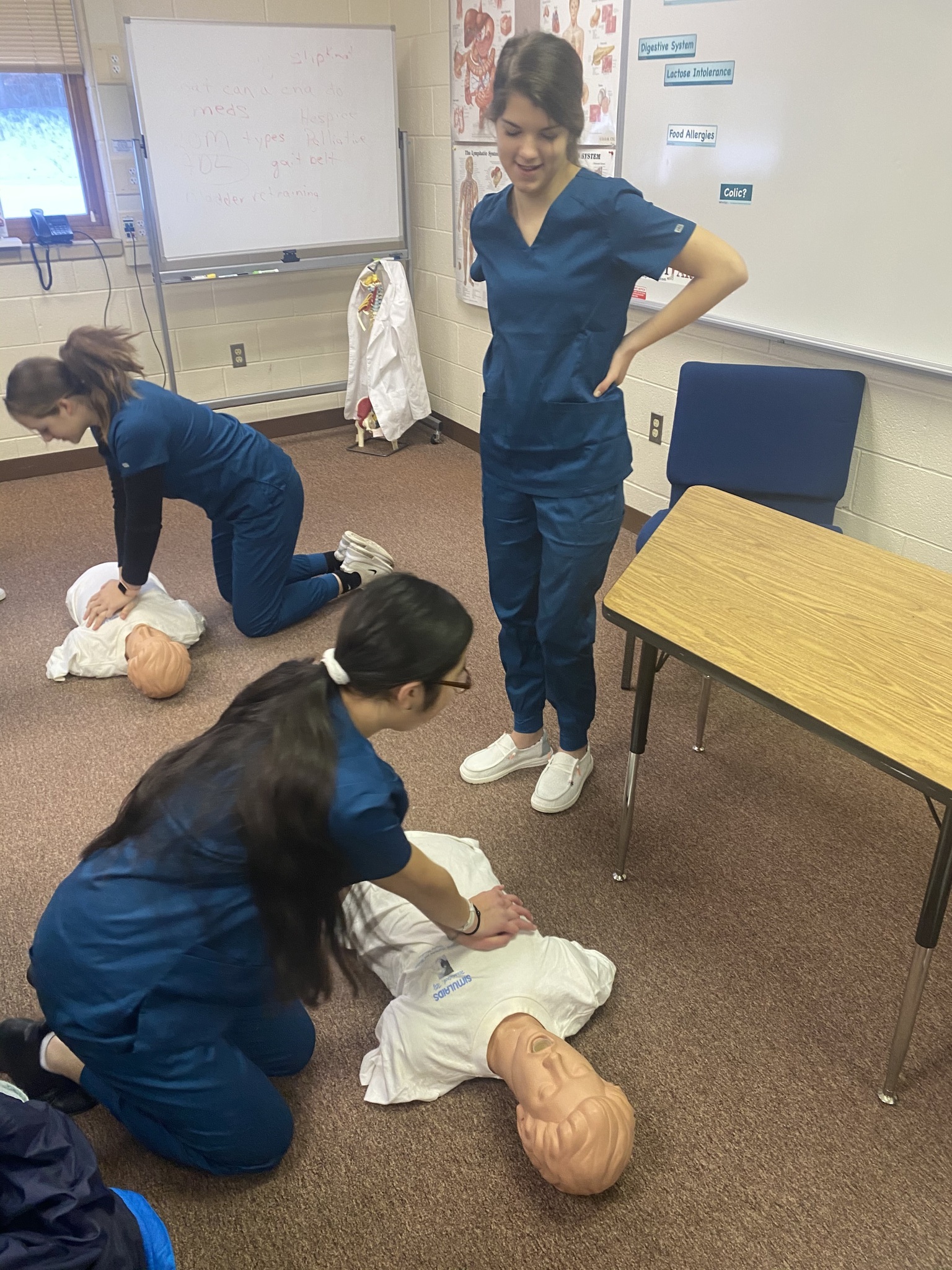 Medical Occupations students practicing CPR