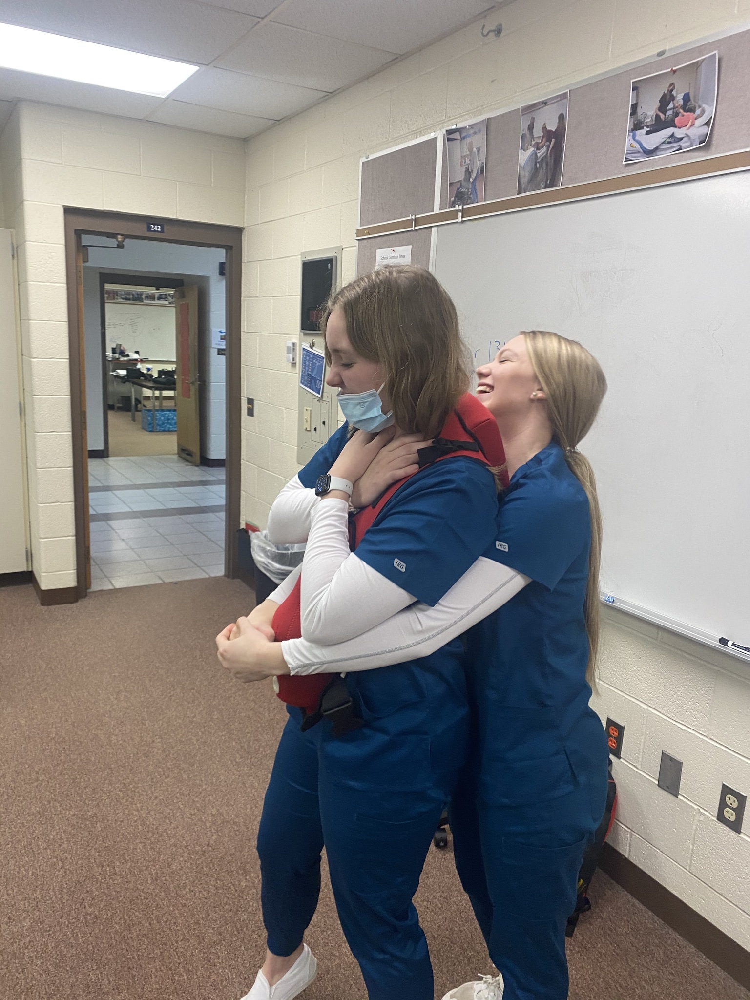 Medical Occupations students practicing Heimlich maneuver