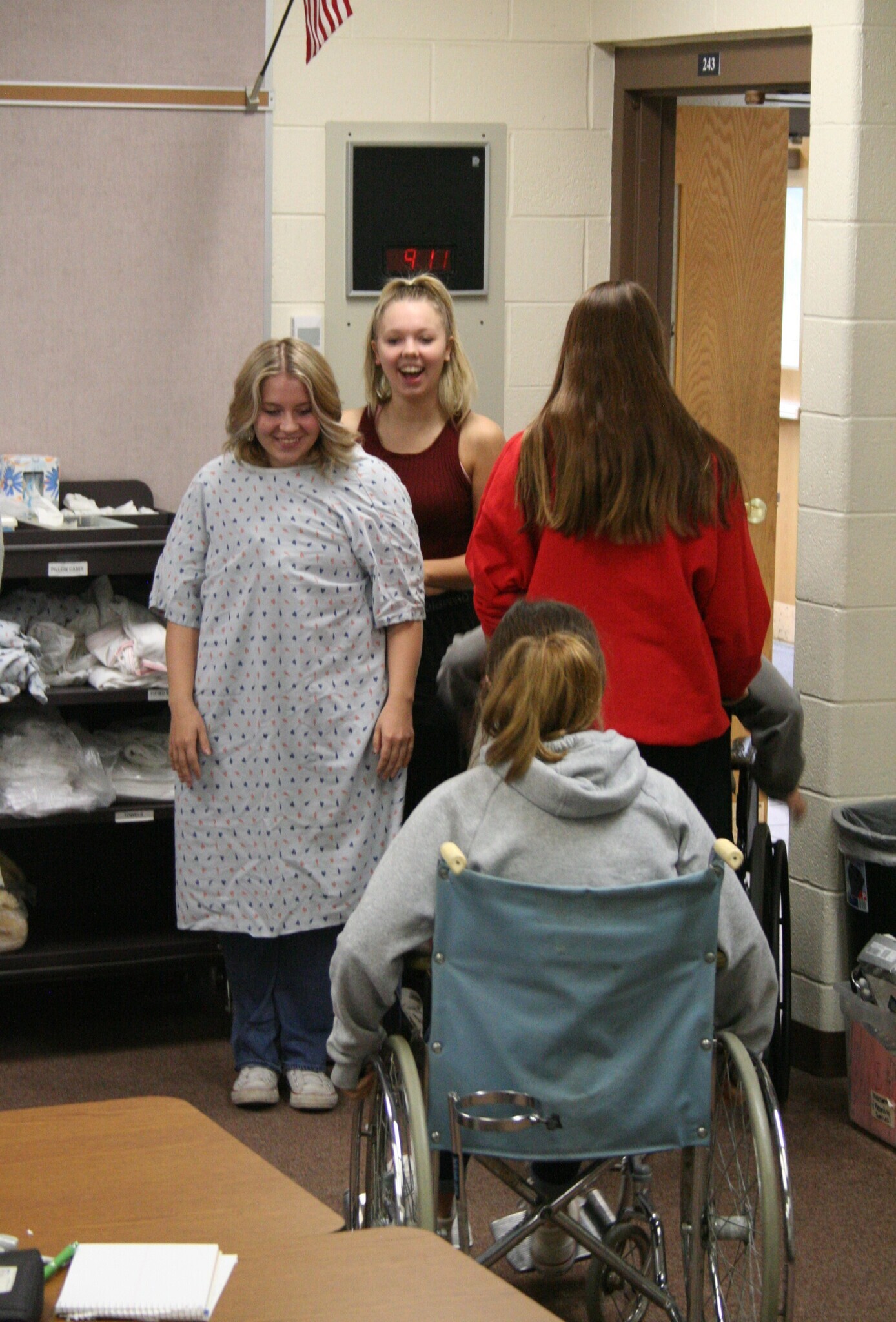 Medical Occupations students dressed in gowns