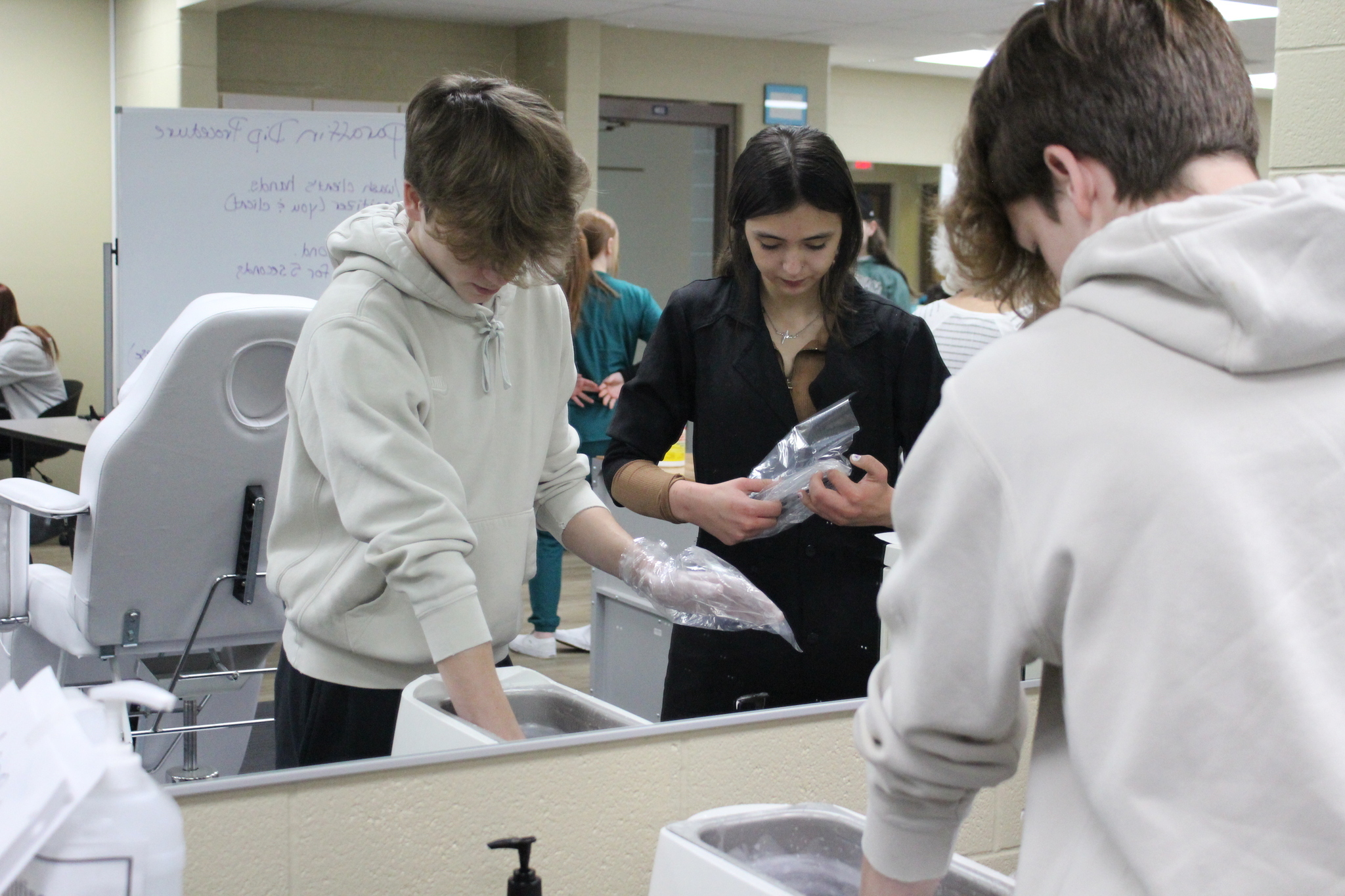 Cosmetology students providing services to others