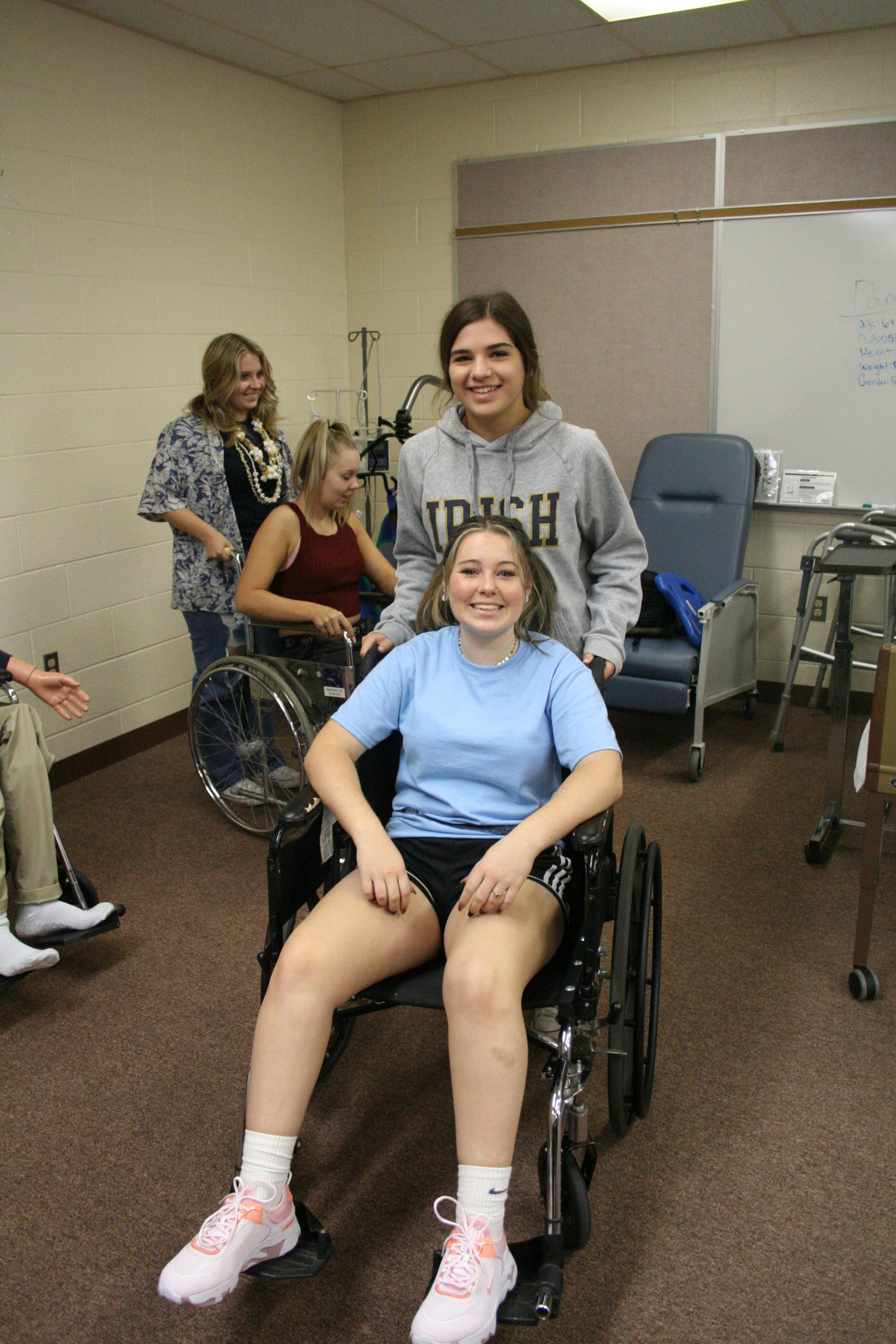 Medical Occupations students in wheelchairs
