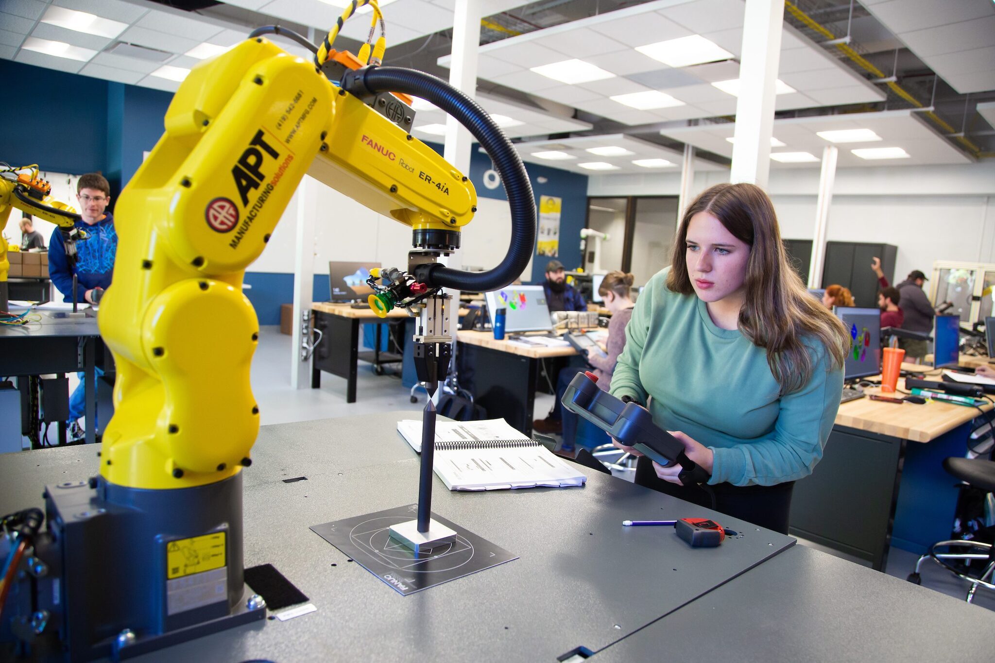 FANUC robot operated by student