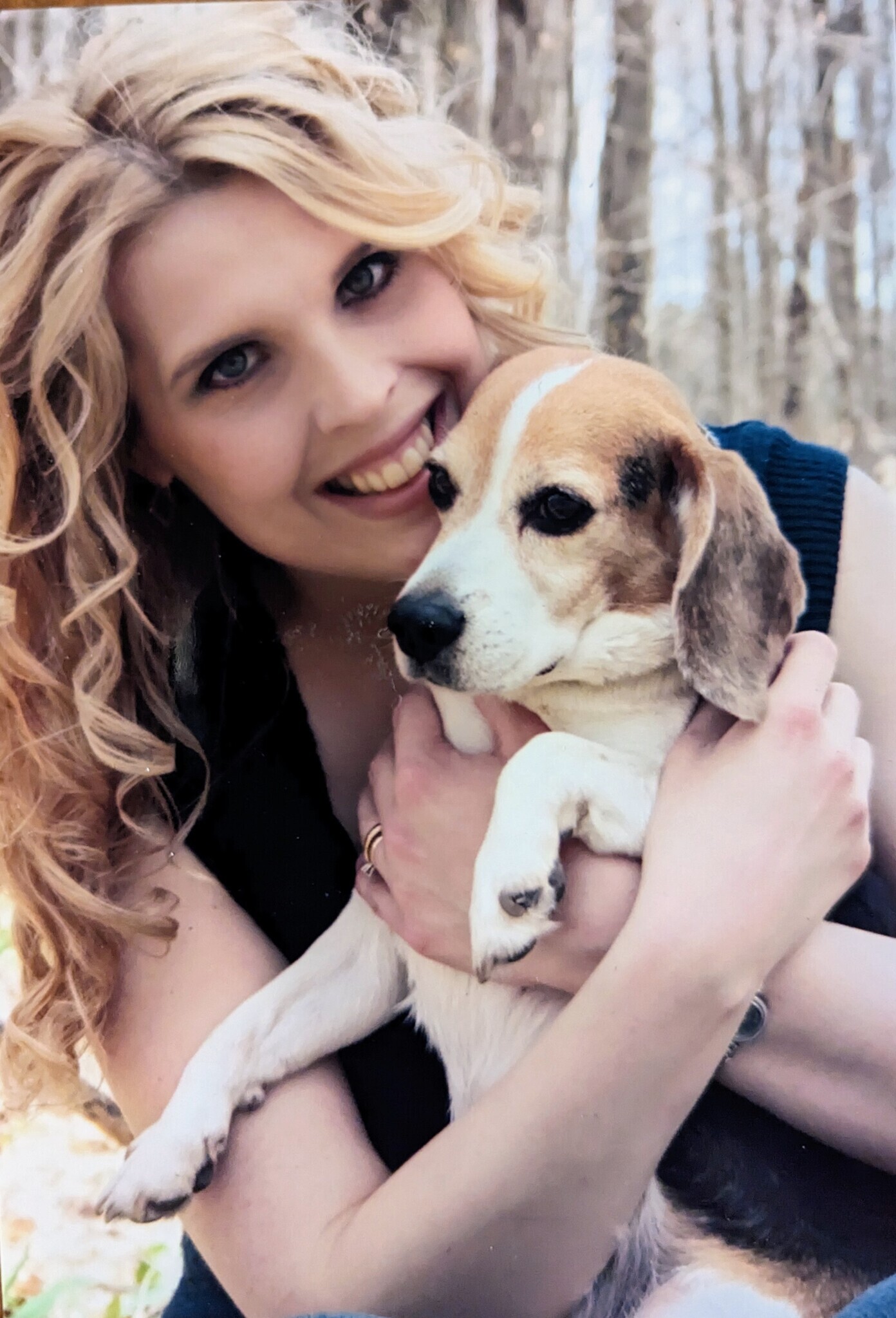 Girl holding a dog